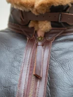 Close-up of the B-6 bomber jacket's cuff shearling detailing and sleeve adjuster
