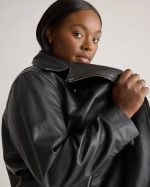 Model wearing Plus Size Black leather Jacket