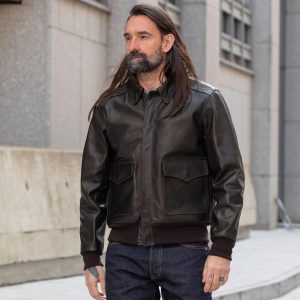 Model wearing brown A-2 pilot leather jacket with combat collar