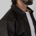 Side profile of civilian A-2 flight jacket with ribbed cuffs and waistband