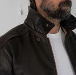 Snap-tab collar detail of civil edition A-2 leather jacket
